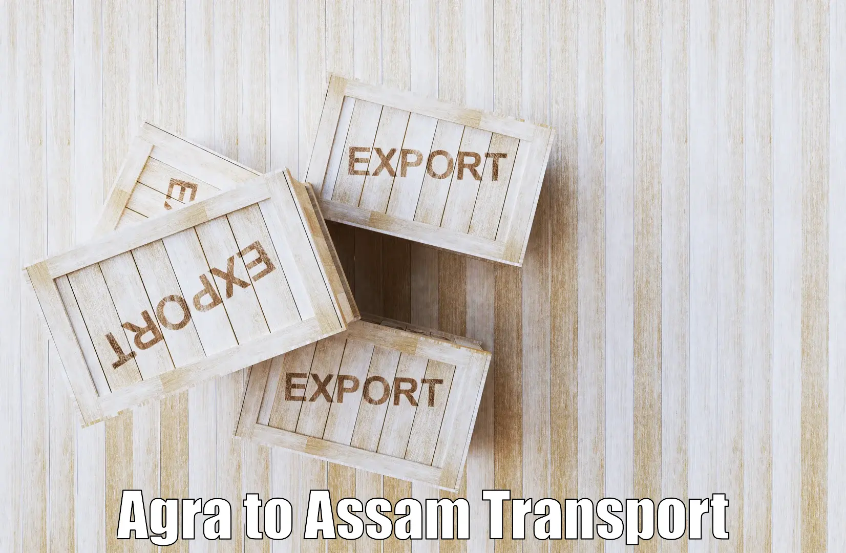 Two wheeler parcel service Agra to Agomani