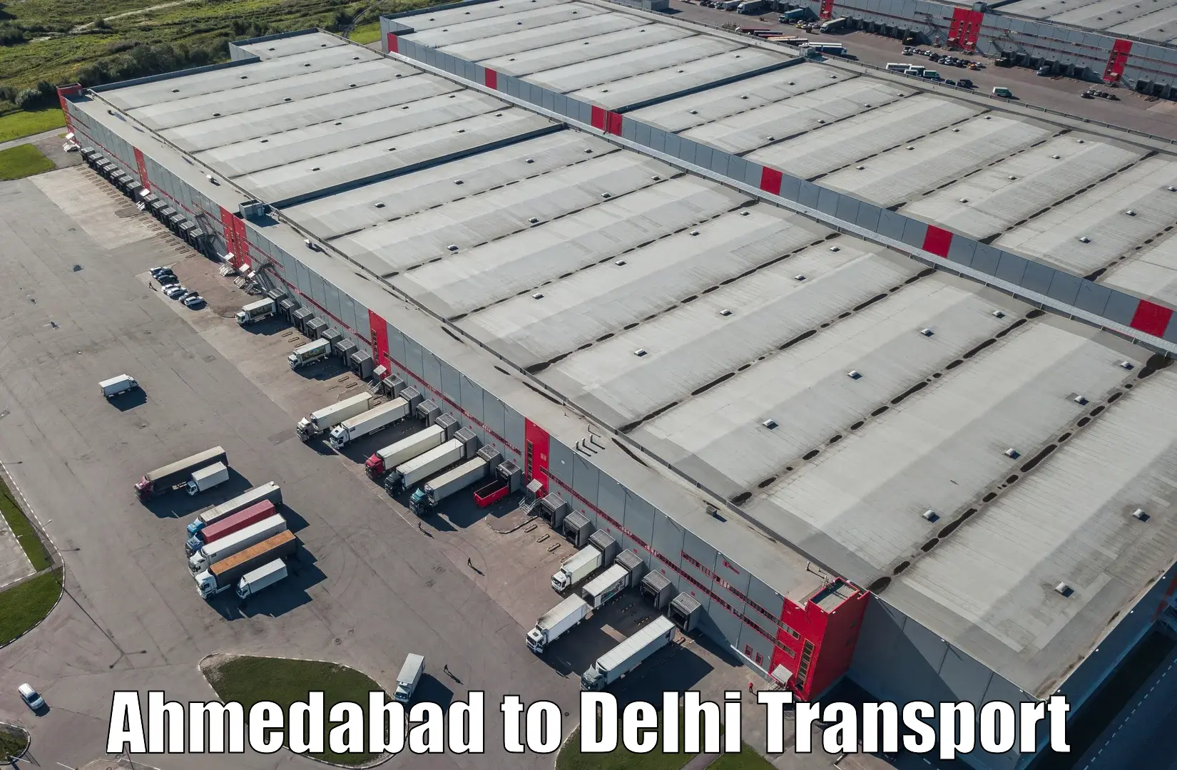Pick up transport service Ahmedabad to Jamia Millia Islamia New Delhi