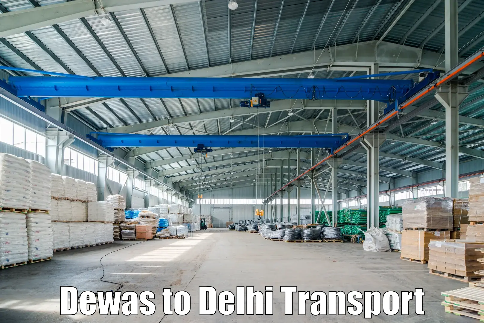 All India transport service Dewas to Jawaharlal Nehru University New Delhi